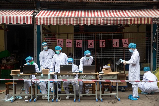 两周检测650万人 武汉怎么做到的